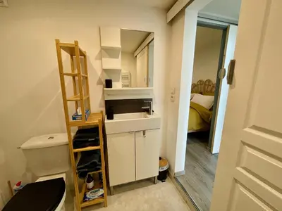 Cuisine ou kitchenette dans l'établissement Charmant appartement en rez-de-chaussée