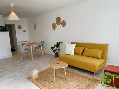 Coin salon dans l'établissement Charmant appartement en rez-de-chaussée