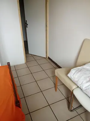 Coin salon dans l'établissement Chambre room in appartement