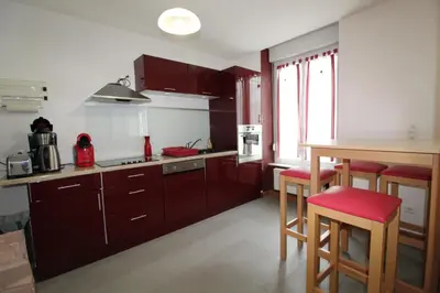 Cuisine ou kitchenette dans l'établissement Appartement tout confort à Gérardmer avec sauna, proche du lac et des commerces