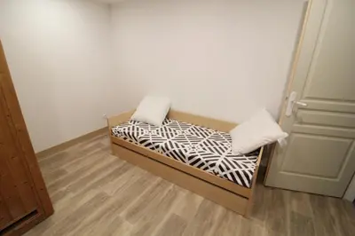 Un ou plusieurs lits dans un hébergement de l'établissement Appartement tout confort à Gérardmer avec sauna, proche du lac et des commerces