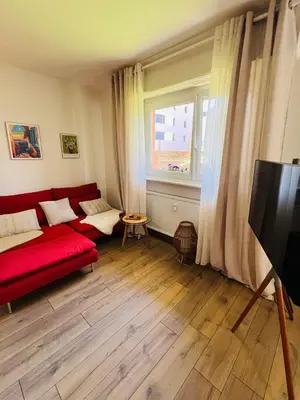 Télévision ou salle de divertissement dans l'établissement Modern Loft Basel Airport ArtBasel
