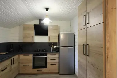 Cuisine ou kitchenette dans l'établissement Chalet 6 personnes au Ménil - Vosges - Vacances nature en famille