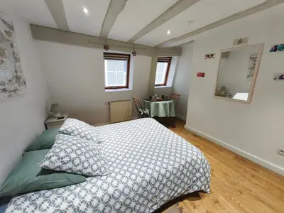 Un ou plusieurs lits dans un hébergement de l'établissement Chambre chez l'habitant - Centre historique - Salle d'eau et WC privés