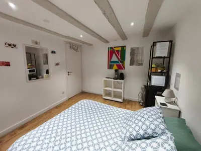 Un ou plusieurs lits dans un hébergement de l'établissement Chambre chez l'habitant - Centre historique - Salle d'eau et WC privés