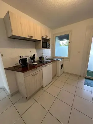 Cuisine ou kitchenette dans l'établissement Appart City