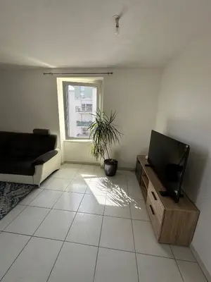Télévision ou salle de divertissement dans l'établissement Appart City