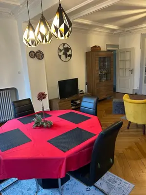 Coin salon dans l'établissement Séjour entre ville et montagnes Appartement 90 m2