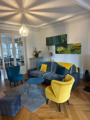 Coin salon dans l'établissement Séjour entre ville et montagnes Appartement 90 m2