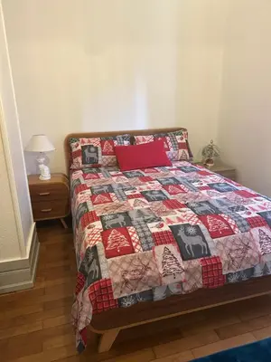 Un ou plusieurs lits dans un hébergement de l'établissement Séjour entre ville et montagnes Appartement 90 m2