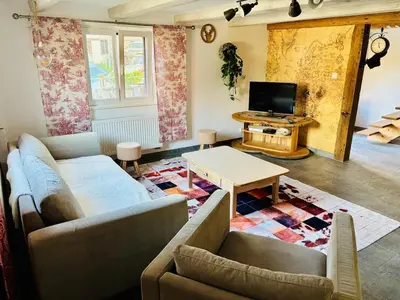 Télévision ou salle de divertissement dans l'établissement Maison individuelle à Ueberstrass