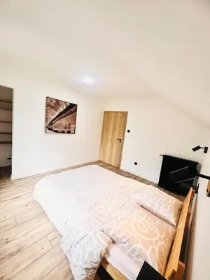 Un ou plusieurs lits dans un hébergement de l'établissement Duplex cosy proche Gérardmer