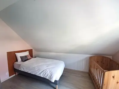 Un ou plusieurs lits dans un hébergement de l'établissement Maison neuve 4 chambres à Soulzbach - FR-1-744-46