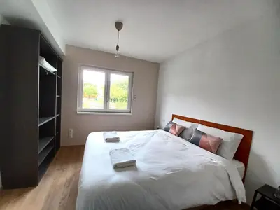 Un ou plusieurs lits dans un hébergement de l'établissement Maison neuve 4 chambres à Soulzbach - FR-1-744-46