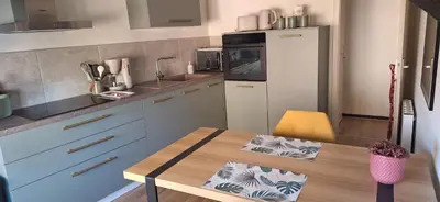 Cuisine ou kitchenette dans l'établissement Gîte ramloc