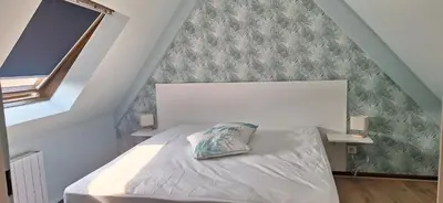 Un ou plusieurs lits dans un hébergement de l'établissement Gîte ramloc