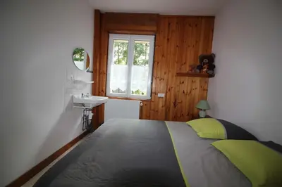 Un ou plusieurs lits dans un hébergement de l'établissement Gîte Les Jonquilles IV