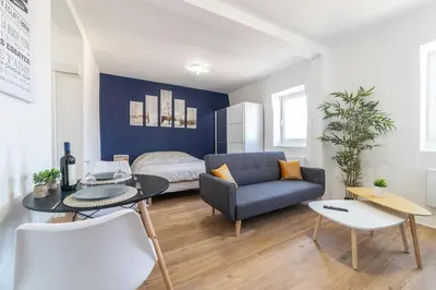 Coin salon dans l'établissement Le Sweet Plaisancier - Parking and Wi-Fi Gratuits-