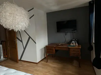 Télévision ou salle de divertissement dans l'établissement Le Rooftop du Schlossberg