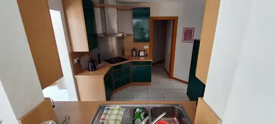 Cuisine ou kitchenette dans l'établissement Très jolie maison avec piscine