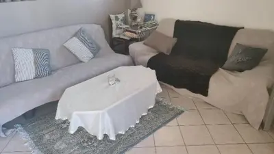 Coin salon dans l'établissement Maison le Trèfle Argenté