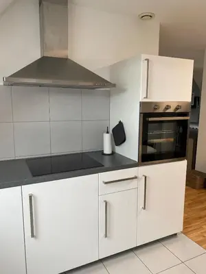 Cuisine ou kitchenette dans l'établissement Grand T3, 2 chambres, jardin au calme - Gîte du Photographe