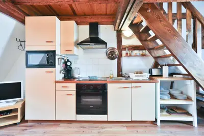 Cuisine ou kitchenette dans l'établissement Duplex 3 châteaux