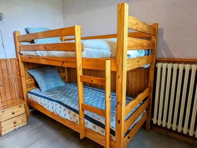 Un ou plusieurs lits dans un hébergement de l'établissement Appartement charmant au pied du Plateau des Mille Etangs à Mélisey - FR-1-583-425