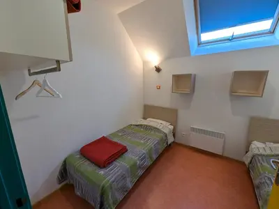 Un ou plusieurs lits dans un hébergement de l'établissement Gîte Le Séquoia: Confort pour 17 personnes, idéal pour randonner dans les Vosges Saônoises - FR-1-583-426