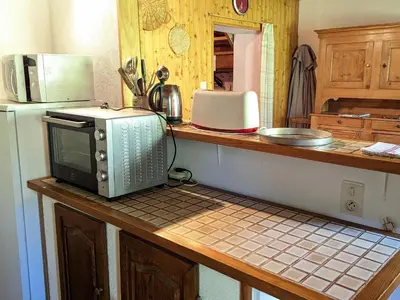 Cuisine ou kitchenette dans l'établissement Gîte isolé au cœur des Vosges, parfait pour randonnées - FR-1-583-430
