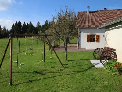 Jardin de l'établissement Gîte de charme dans les Vosges Saônoises - FR-1-583-412