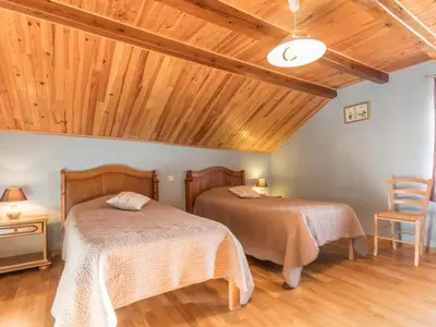 Un ou plusieurs lits dans un hébergement de l'établissement Gîte de charme dans les Vosges Saônoises - FR-1-583-412