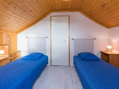 Un ou plusieurs lits dans un hébergement de l'établissement Maison calme avec sauna et vue Vosges - FR-1-583-453