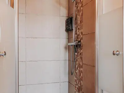 Salle de bains dans l'établissement Gîte avec espace bien-être, sauna et hammam à Moffans-et-Vacheresse - FR-1-583-447