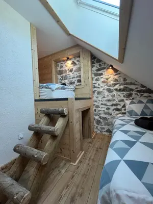 Un ou plusieurs lits dans un hébergement de l'établissement Le Moulin