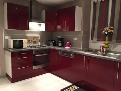 Cuisine ou kitchenette dans l'établissement Rochire Location 2