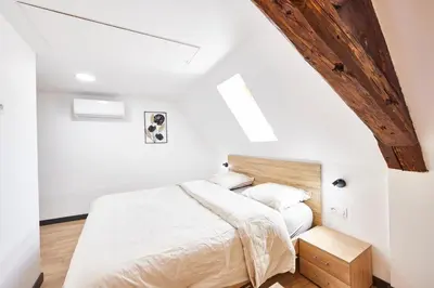 Un ou plusieurs lits dans un hébergement de l'établissement TH 202 Charmant duplex F4 au 2ème étage - 7 personnes