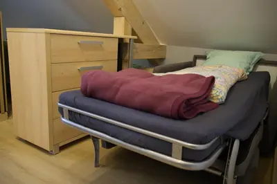 Un ou plusieurs lits dans un hébergement de l'établissement Azalée cocooning appartement