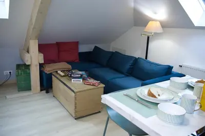 Coin salon dans l'établissement Azalée cocooning appartement