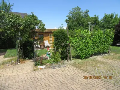 Jardin de l'établissement Charmante suite avec SPA sur la propriété