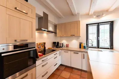 Cuisine ou kitchenette dans l'établissement Entre vignes et Vosges