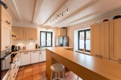 Cuisine ou kitchenette dans l'établissement Entre vignes et Vosges