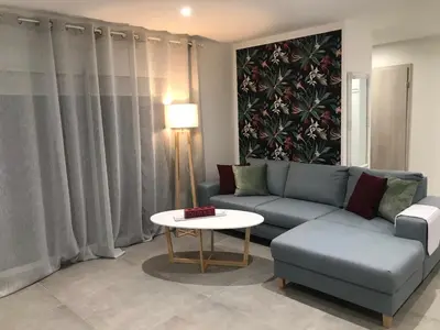 Coin salon dans l'établissement Agrita Home