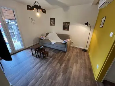 Un ou plusieurs lits dans un hébergement de l'établissement La Cour de Mamama Appartement 4