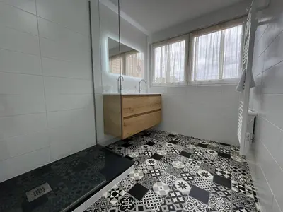 Un ou plusieurs lits dans un hébergement de l'établissement La Cour de Mamama Appartement 5
