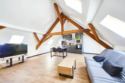 Télévision ou salle de divertissement dans l'établissement TH 102 Appartement F2 en duplex tout confort 1 à 3 personnes