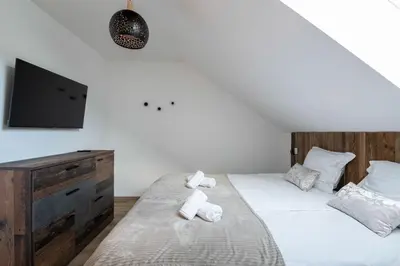 Un ou plusieurs lits dans un hébergement de l'établissement Le Chalet de Maeva, Jacuzzi, et Terrace