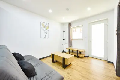 Coin salon dans l'établissement TH 103 Appartement F2 à Thann 1 à 3 personnes