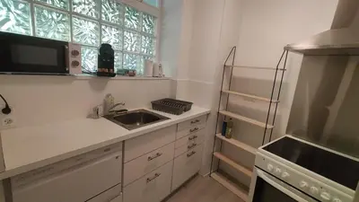 Cuisine ou kitchenette dans l'établissement Plain-pied, à 2 pas du château