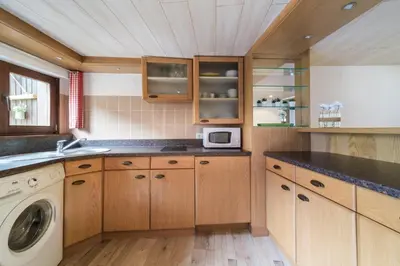 Cuisine ou kitchenette dans l'établissement Le studio